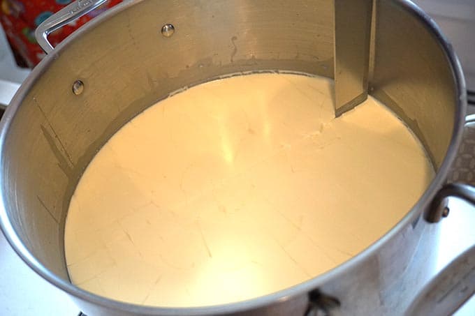 A large pot containing a smooth layer of cream.