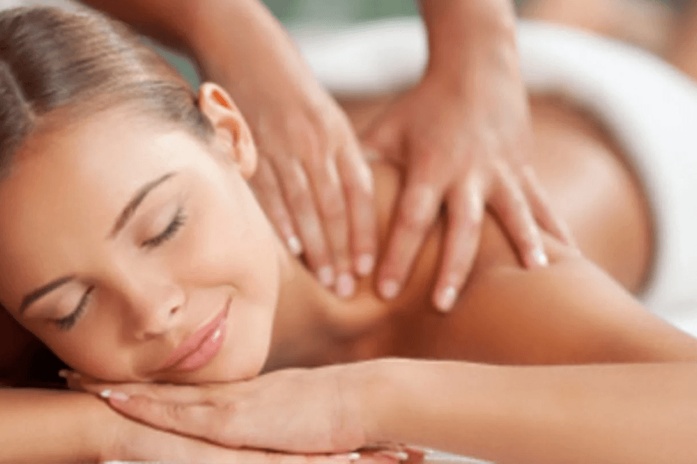 A woman enjoying a relaxing massage.